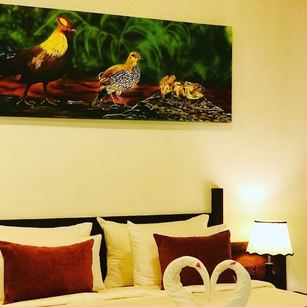 NATURALIZA Deluxe Double Room, Balcony, Garden View 6