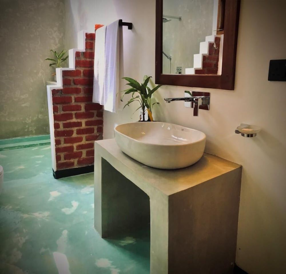 NATURALIZA Deluxe Double Room, Balcony, Garden View 8