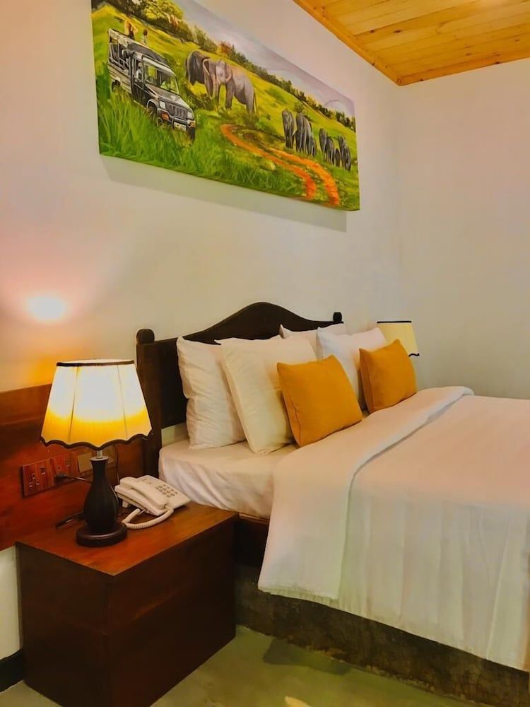 NATURALIZA Deluxe Double Room, Balcony, Garden View 5