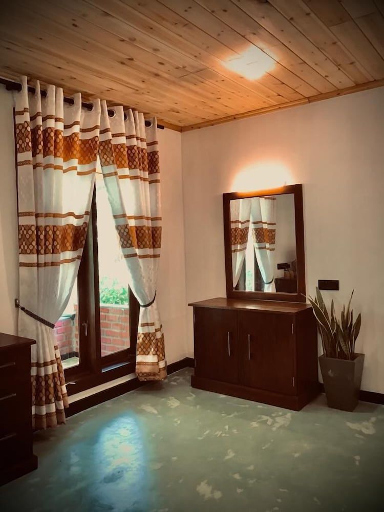 NATURALIZA Deluxe Double Room, Balcony, Garden View 11