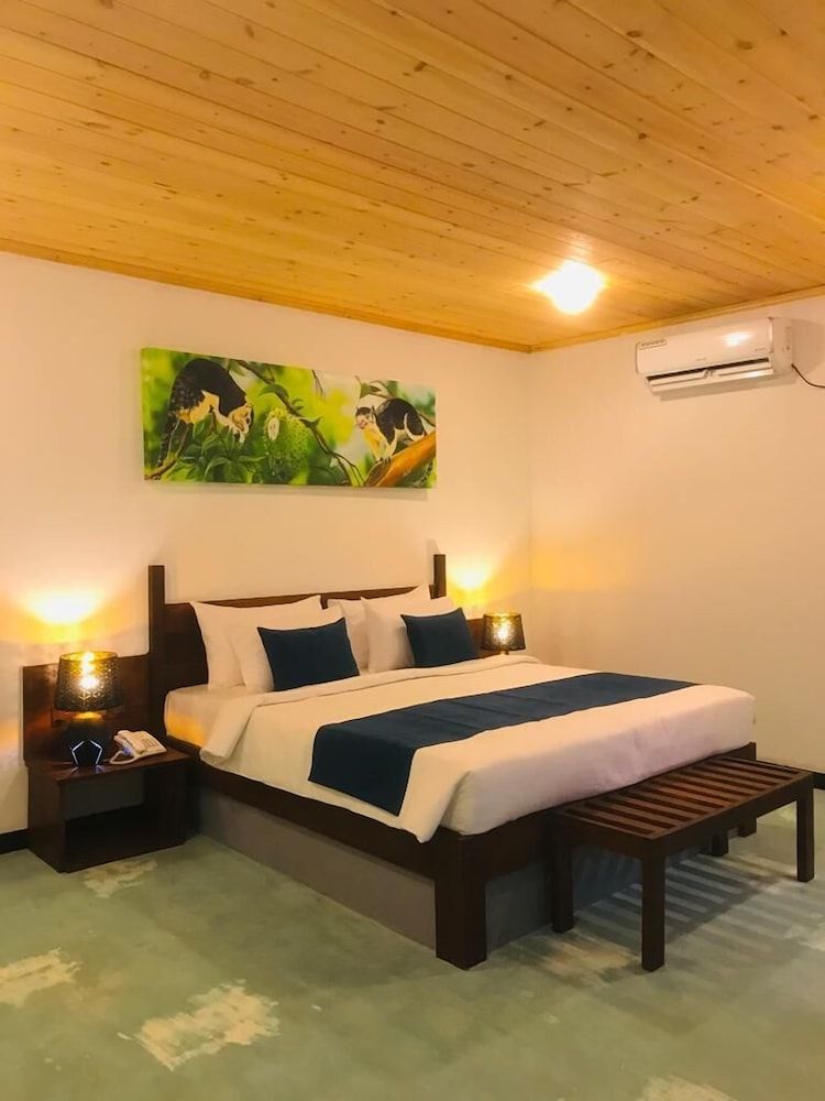 NATURALIZA Deluxe Double Room, Balcony, Garden View 4