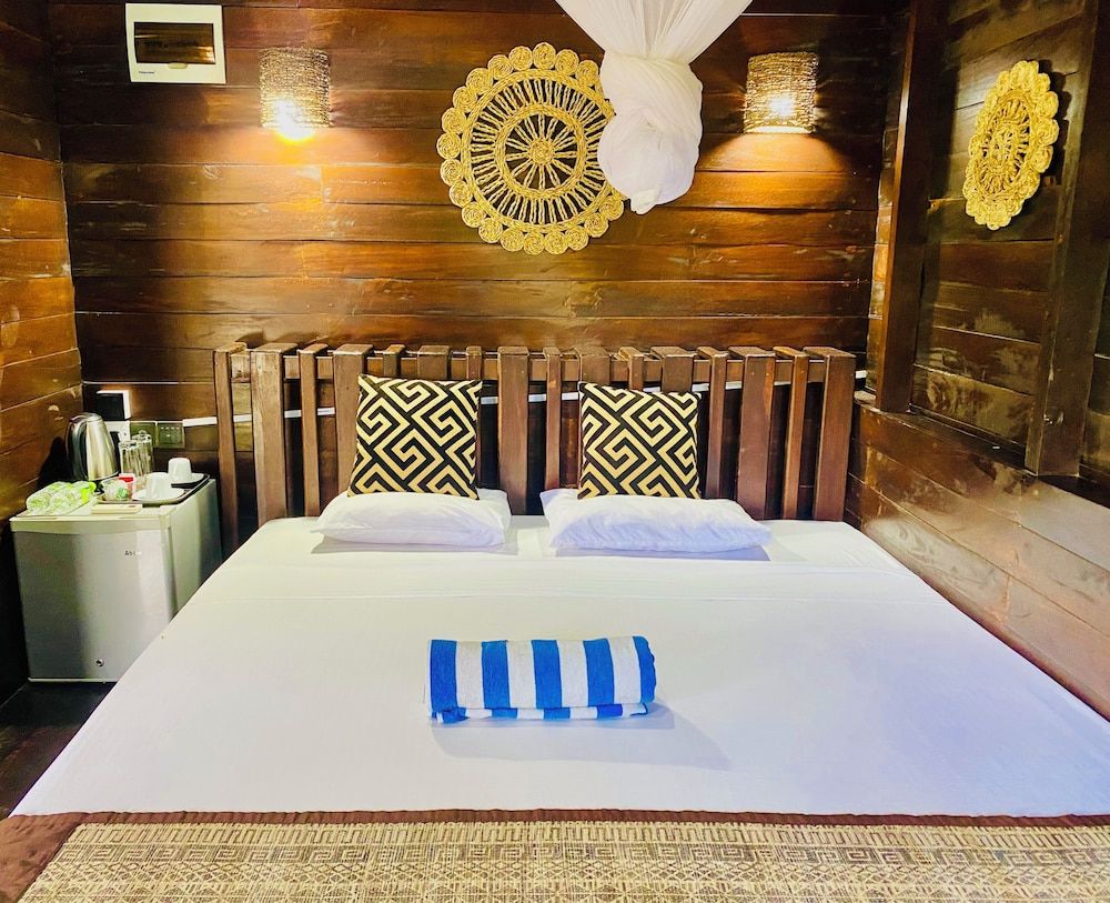 Coco Palm Villa and Cabanas Deluxe Chalet, Balcony, Garden View 3