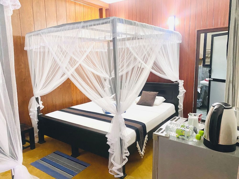 Coco Palm Villa and Cabanas Deluxe Double Room, Balcony, Garden View 2