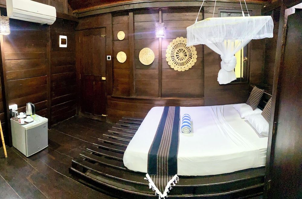 Coco Palm Villa and Cabanas Deluxe Chalet, Balcony, Garden View 5