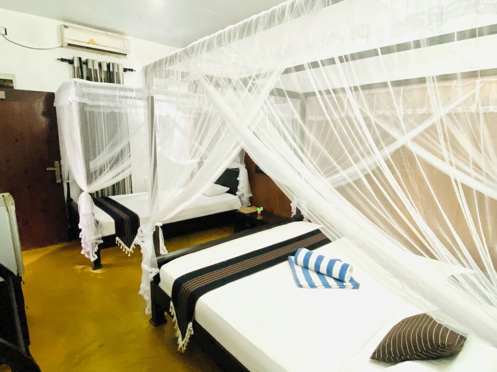 Coco Palm Villa and Cabanas Deluxe Double Room, Balcony, Garden View 7