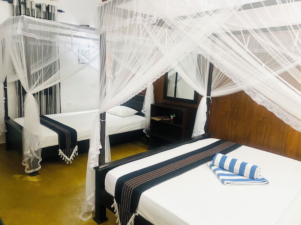 Coco Palm Villa and Cabanas Deluxe Double Room, Balcony, Garden View 5