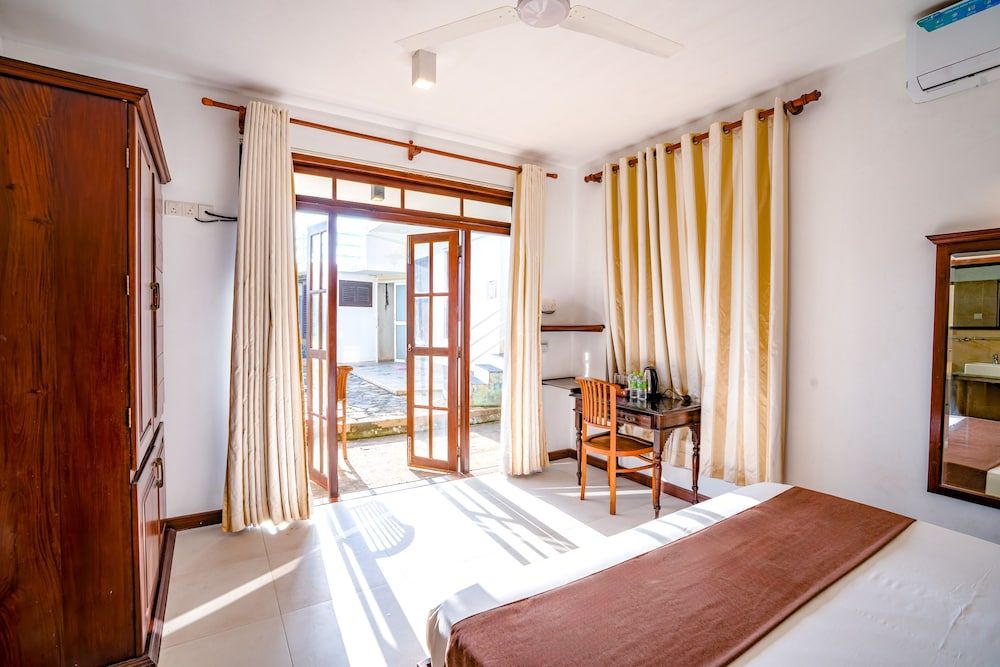 Scarlet White Resort Deluxe Double Room, Garden View 5