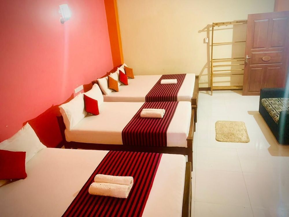 Cinnamon Tree Comfort Quadruple Room, Patio, Garden View 3