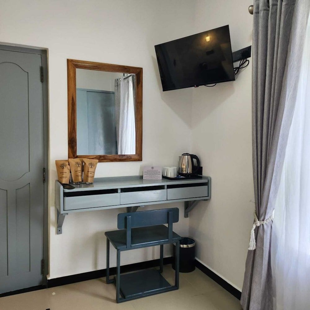 Neem Tree House Deluxe Triple Room, Courtyard View 7