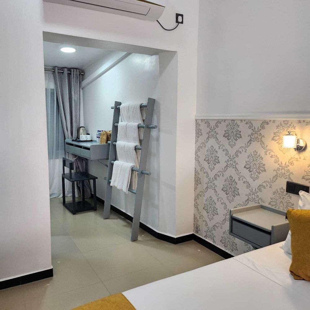 Neem Tree House Deluxe Quadruple Room, City View 4