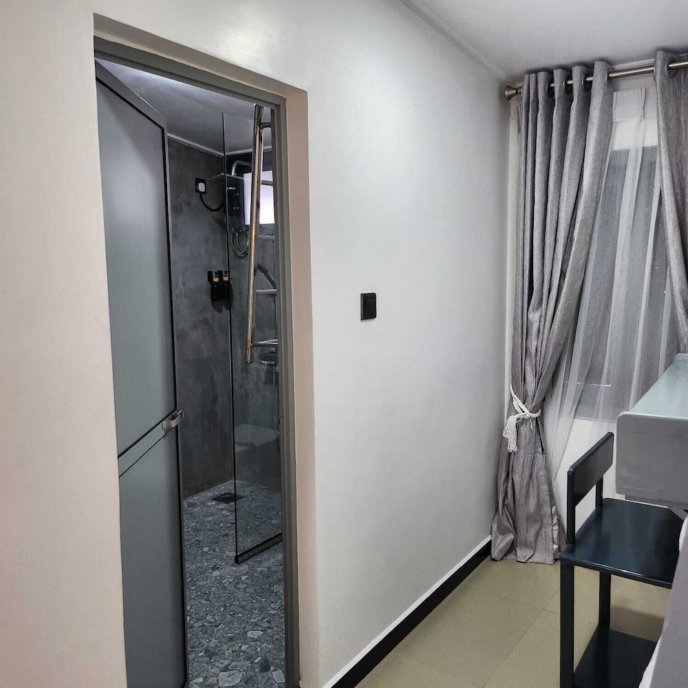 Neem Tree House Deluxe Quadruple Room, City View 6