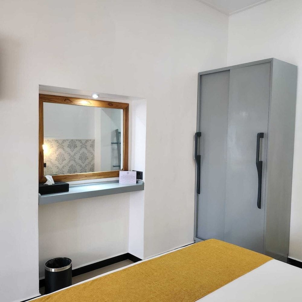 Neem Tree House Deluxe Quadruple Room, City View 5