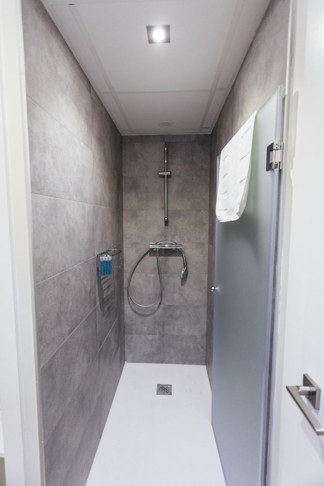 One&Lux Byron Suites Deluxe Room 8