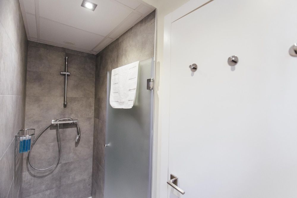 One&Lux Byron Suites Deluxe Room 9