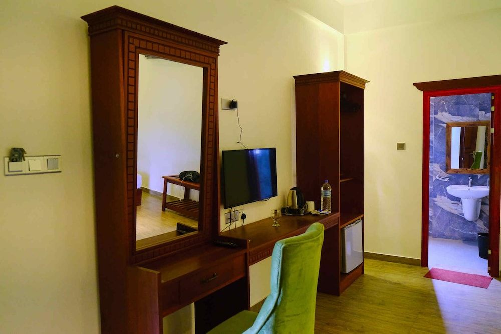 Polhena Grand Resort Deluxe Triple Room 4