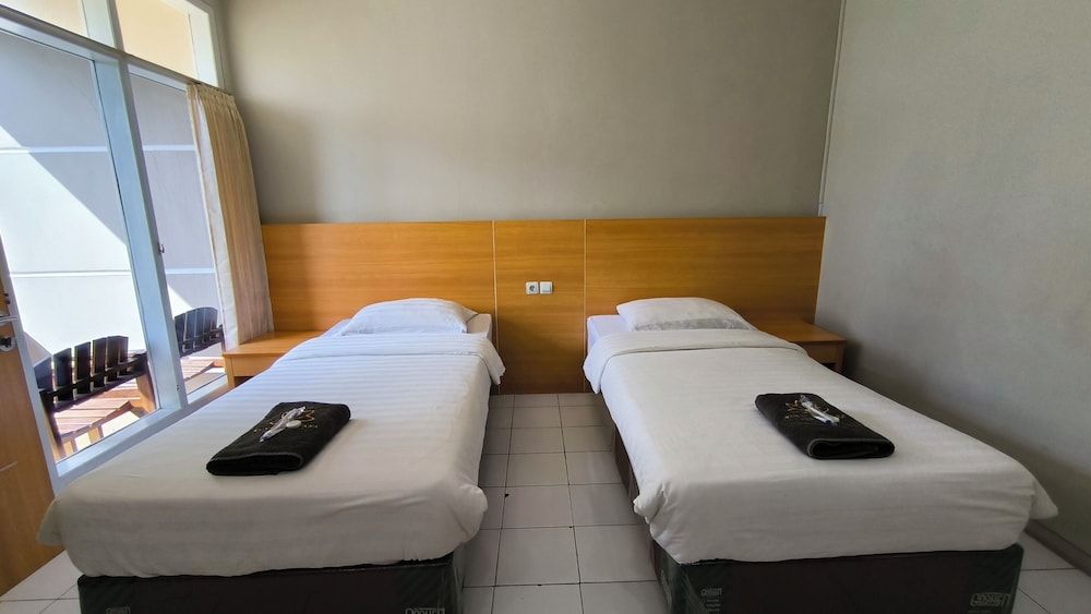 Royal Kencana powered by Cocotel Deluxe Twin Room 4