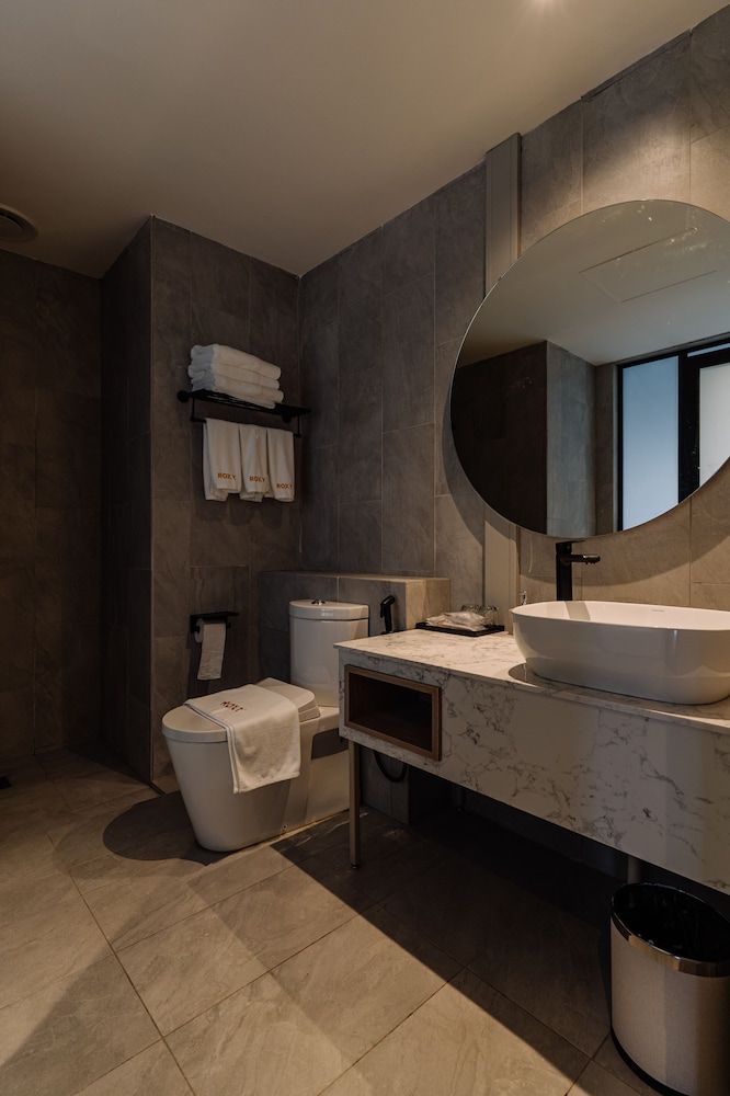 Impiana by Roxy Hotel Deluxe Triple Room, Multiple Beds 3