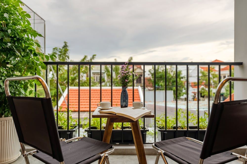 Cat Tien Villa Hoi An Family Triple Room, Pool View 7