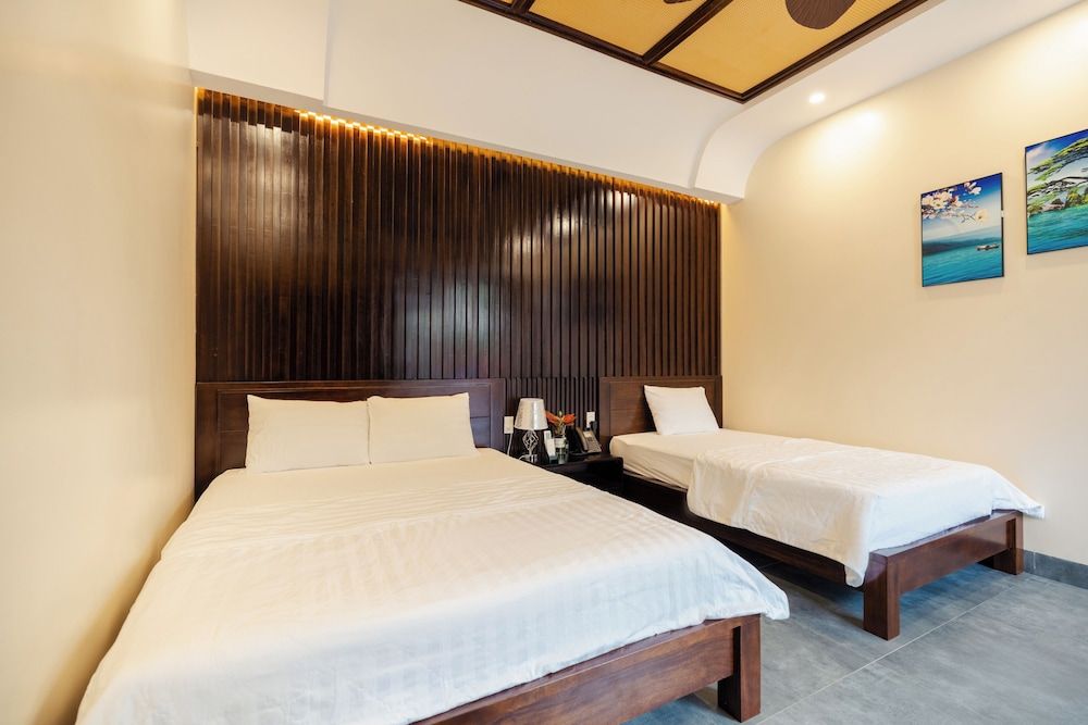 Victory Homestay Deluxe Triple Room, Pool View 3