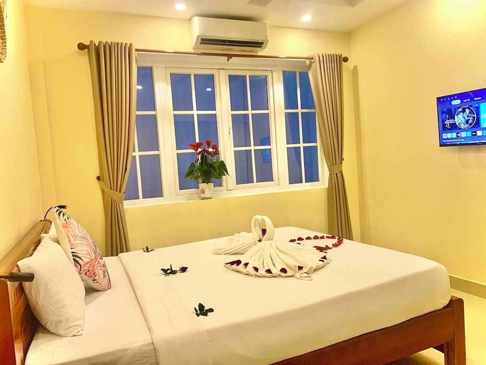 Aman Riverside Hotel Deluxe Double or Twin Room, Courtyard View 5