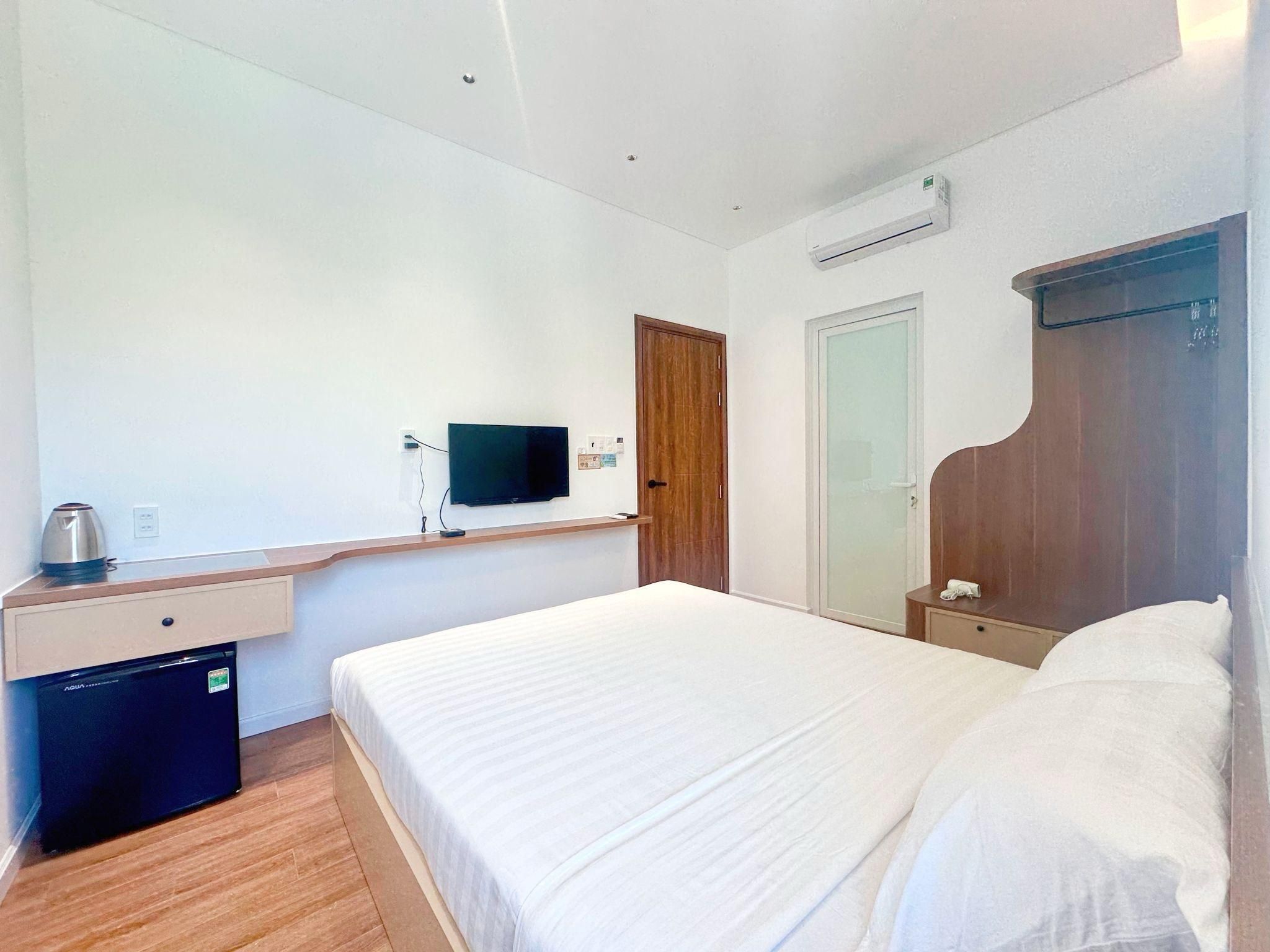 Deluxe - 1 Queen Bed