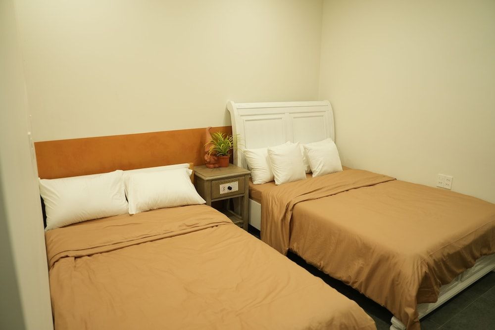 NUBA Homestay and Coffee Buon Ma Thuot Deluxe Triple Room, Garden View 2