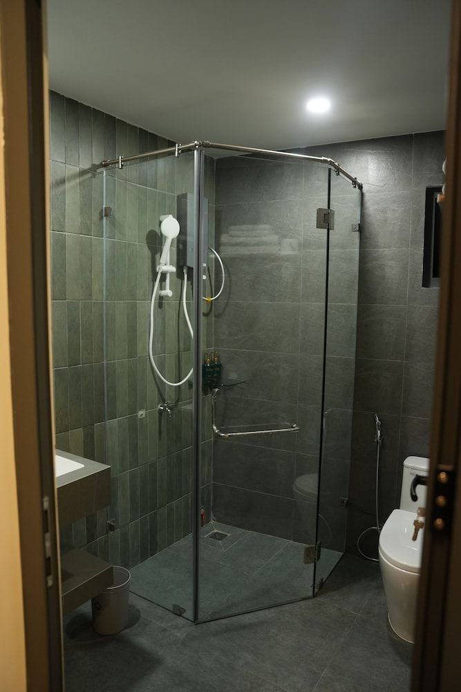 NUBA Homestay and Coffee Buon Ma Thuot Deluxe Triple Room, Garden View 9