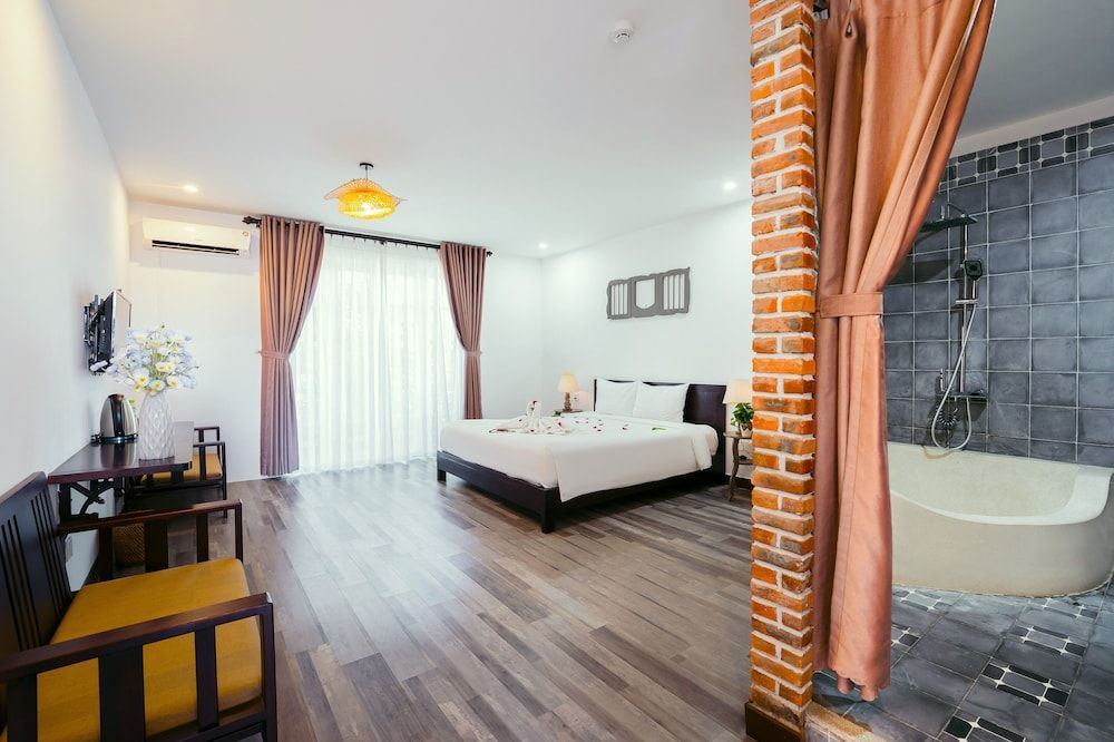 Ancient Garden Boutique Hoi An Deluxe Double Room, Garden View 6