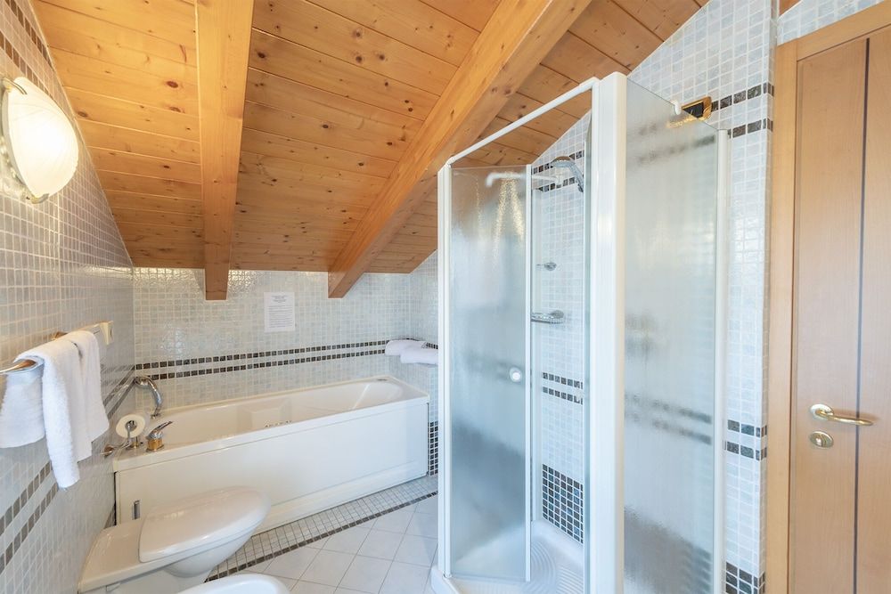 Hotel Relais Orsingher Junior Quadruple Room 3