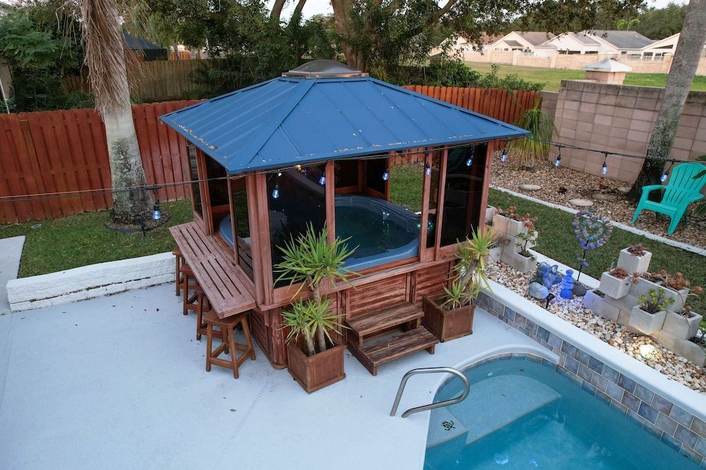 Gorgeous Urban Oasis W/hot Tub, Heated Pool And Private Movie Theater 3 Bedroom Home by RedAwning House, 3 Bedrooms 43
