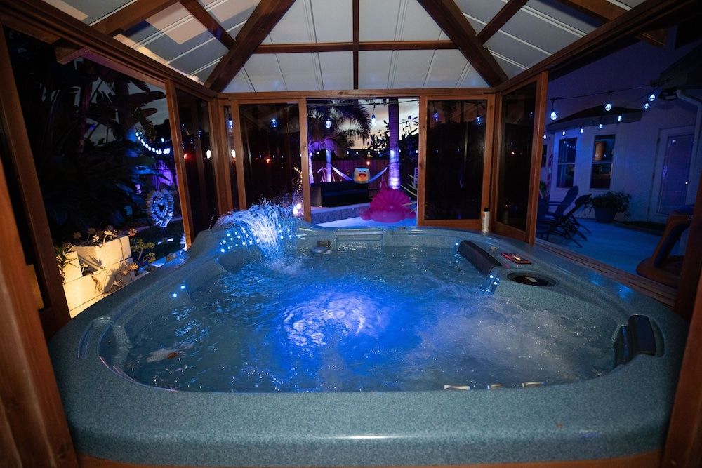 Gorgeous Urban Oasis W/hot Tub, Heated Pool And Private Movie Theater 3 Bedroom Home by RedAwning House, 3 Bedrooms 49