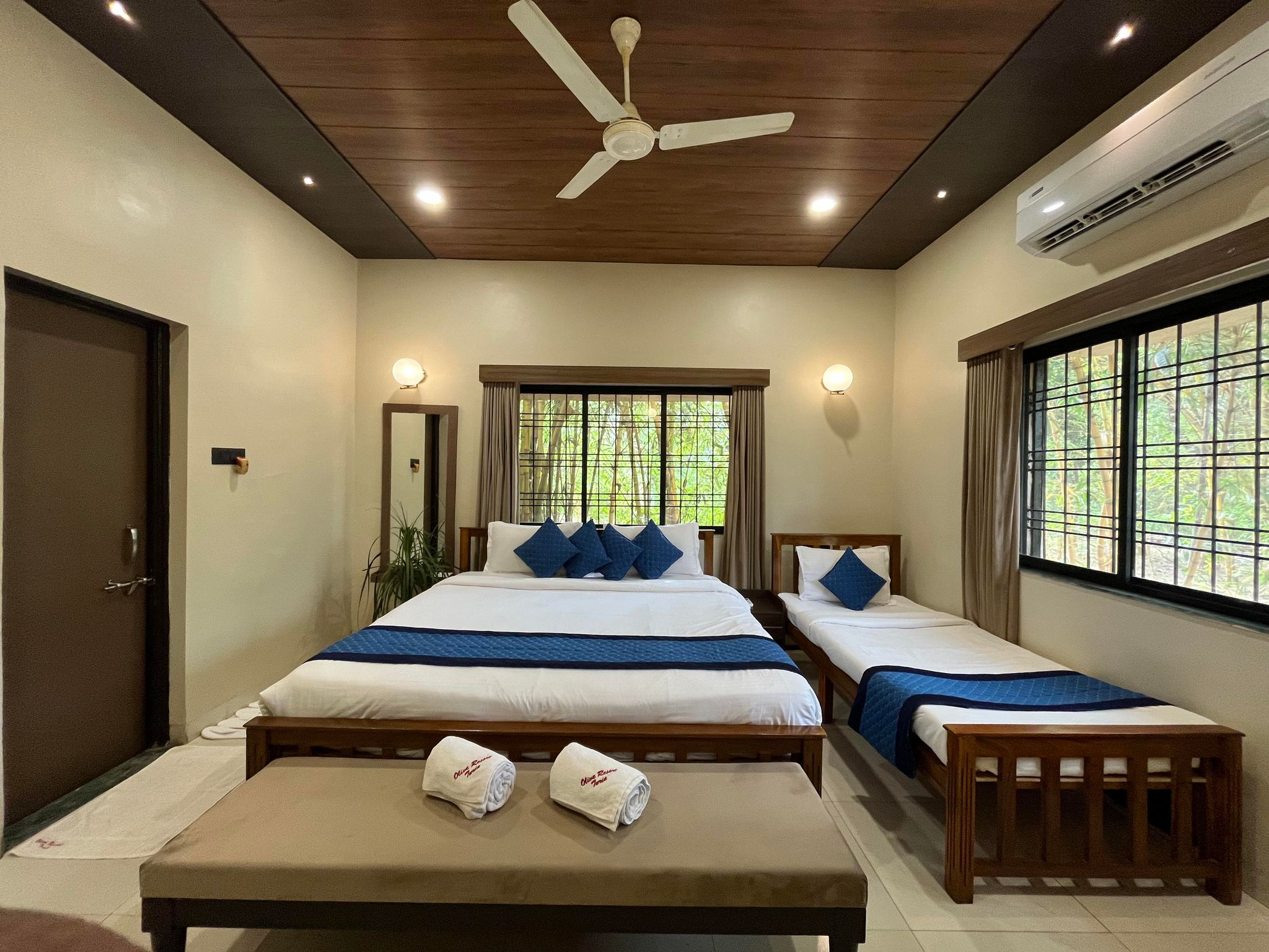 Olive Green Resorts and Villa Room In a Luxury Villa