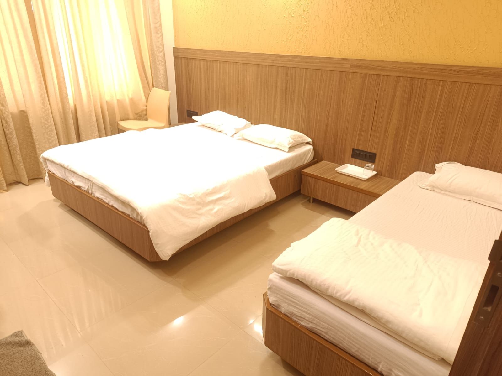 Ambika Residency Triple Bed Ac Deluxe Room