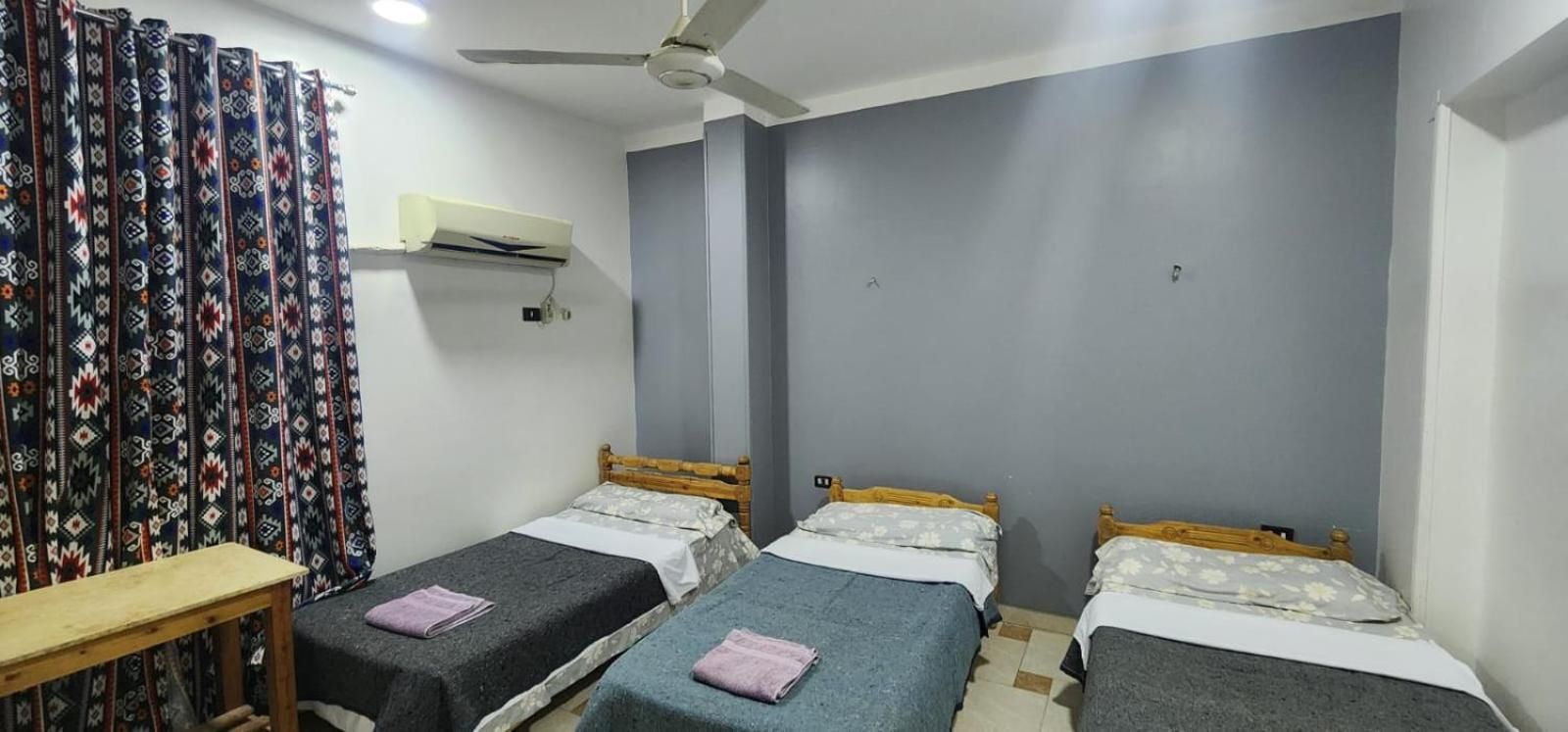 Basic Triple Room with Shared Bathroom