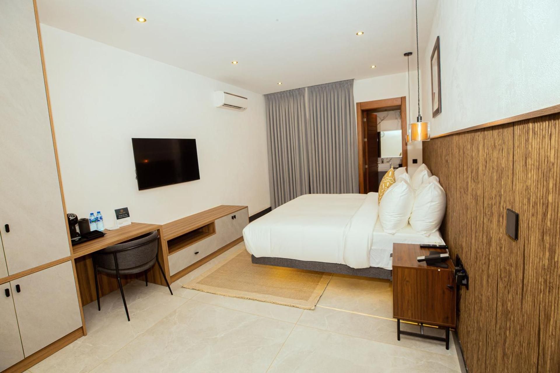 One-Bedroom Apartment with Balcony and City View