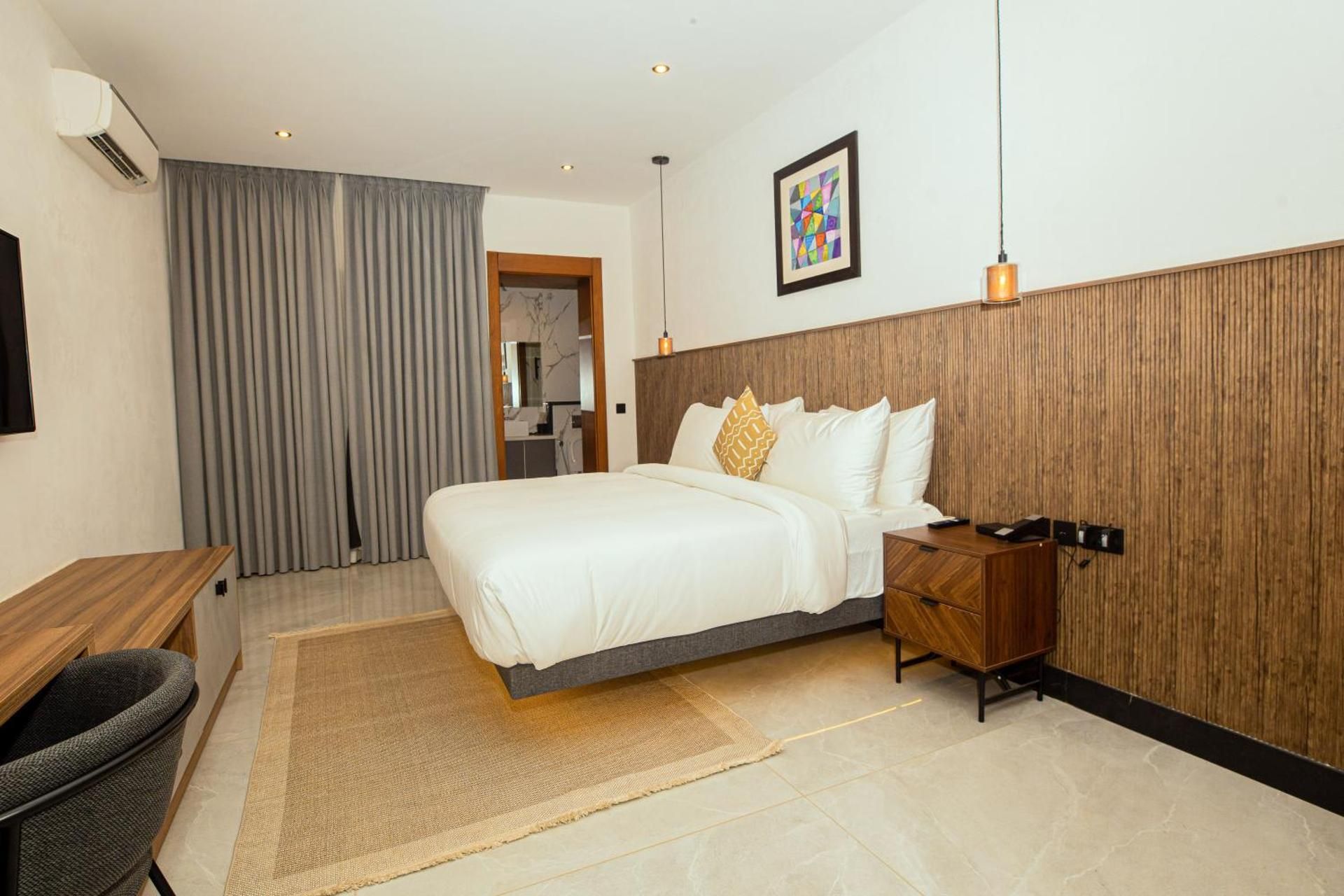 One-Bedroom Apartment with Balcony and City View