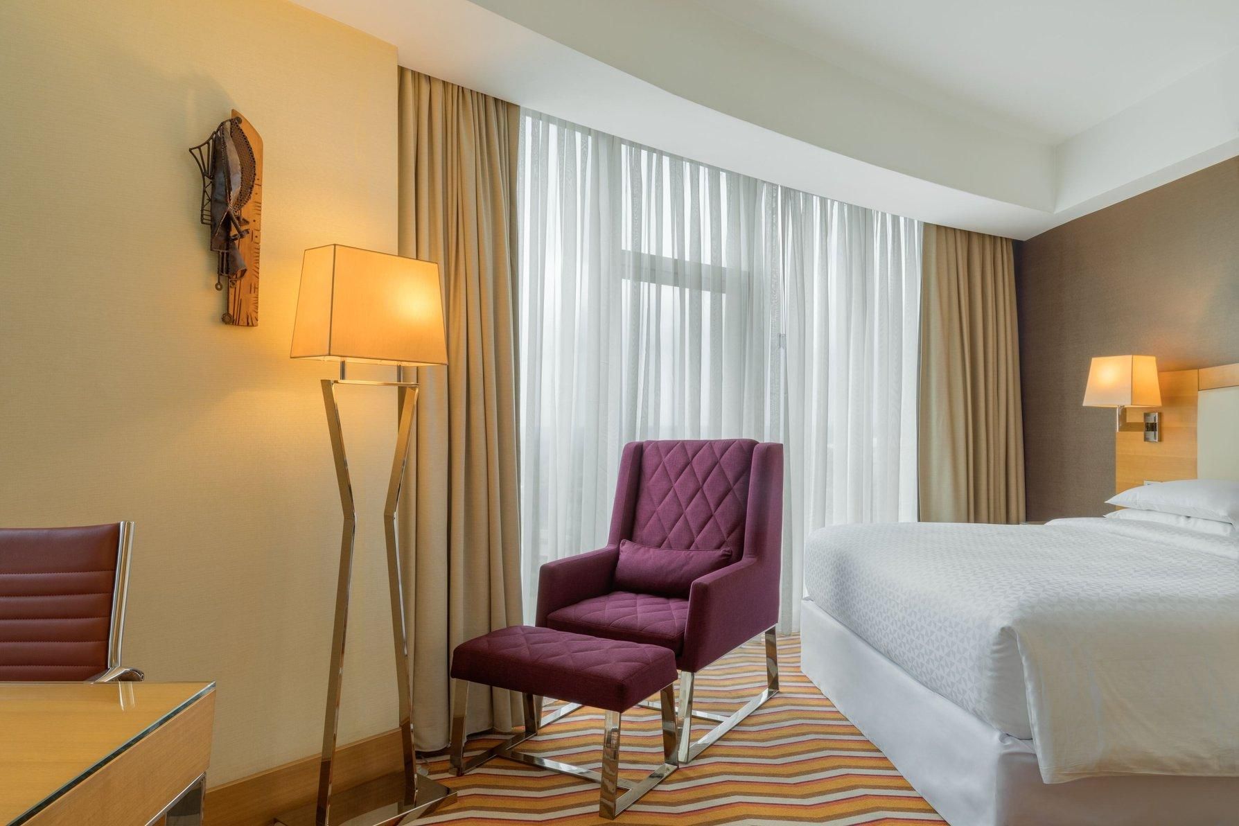 Guest Room, 1 King, City View, Corner Room, Away from Elevator