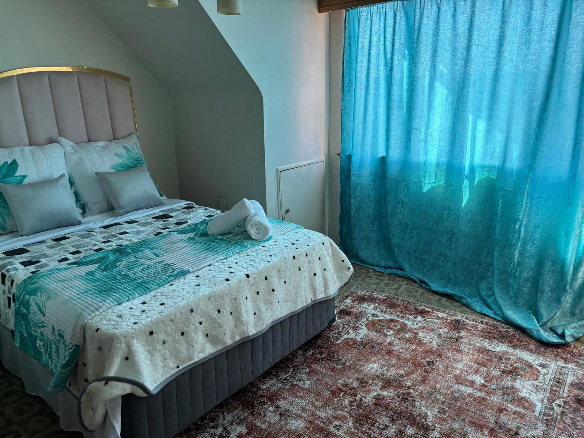 Economy Quadruple Room with Shared Bathroom