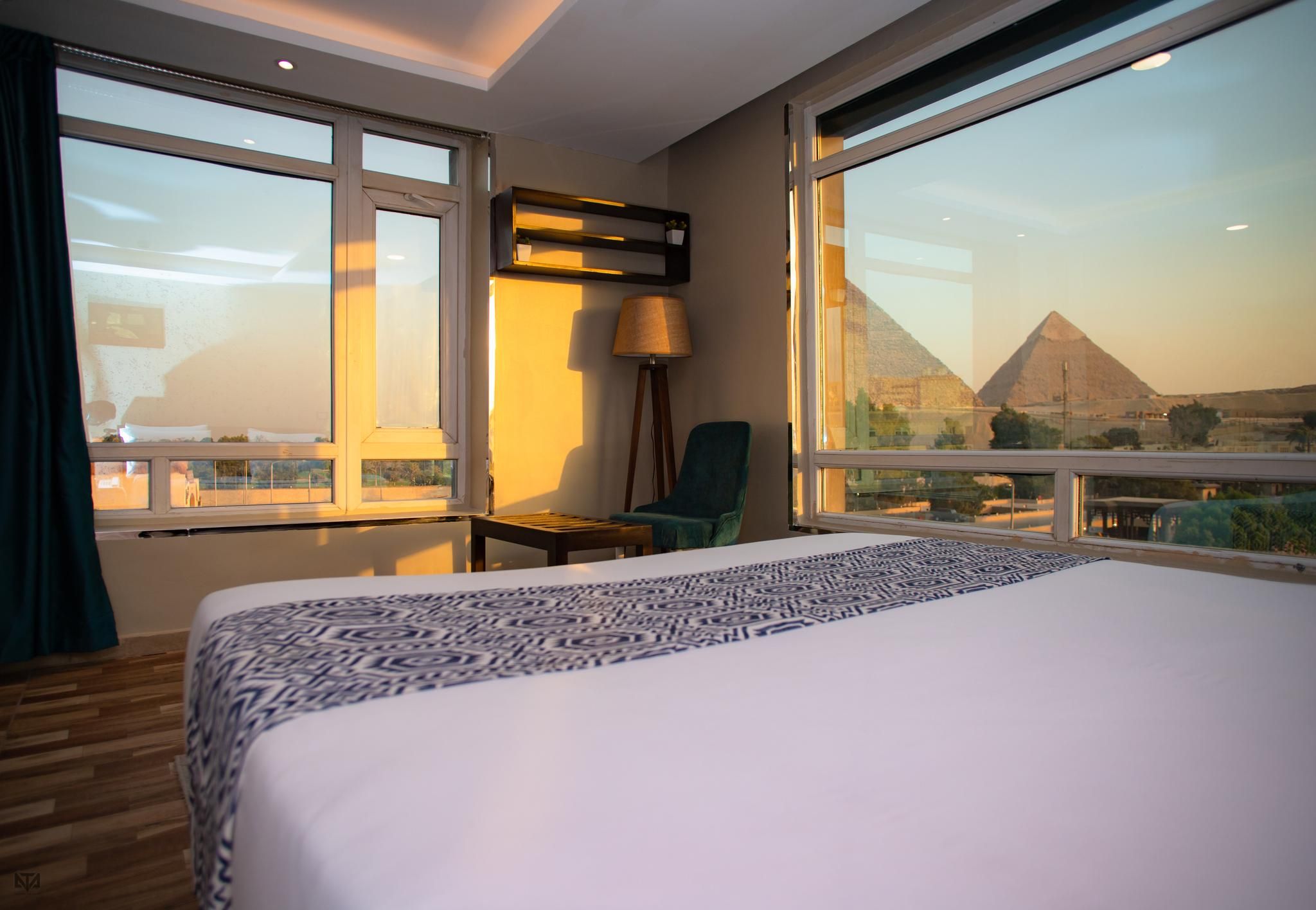 Turquoise Pyramids & Grand Egyptian museum view Hotel Quadruple Room with Balcony