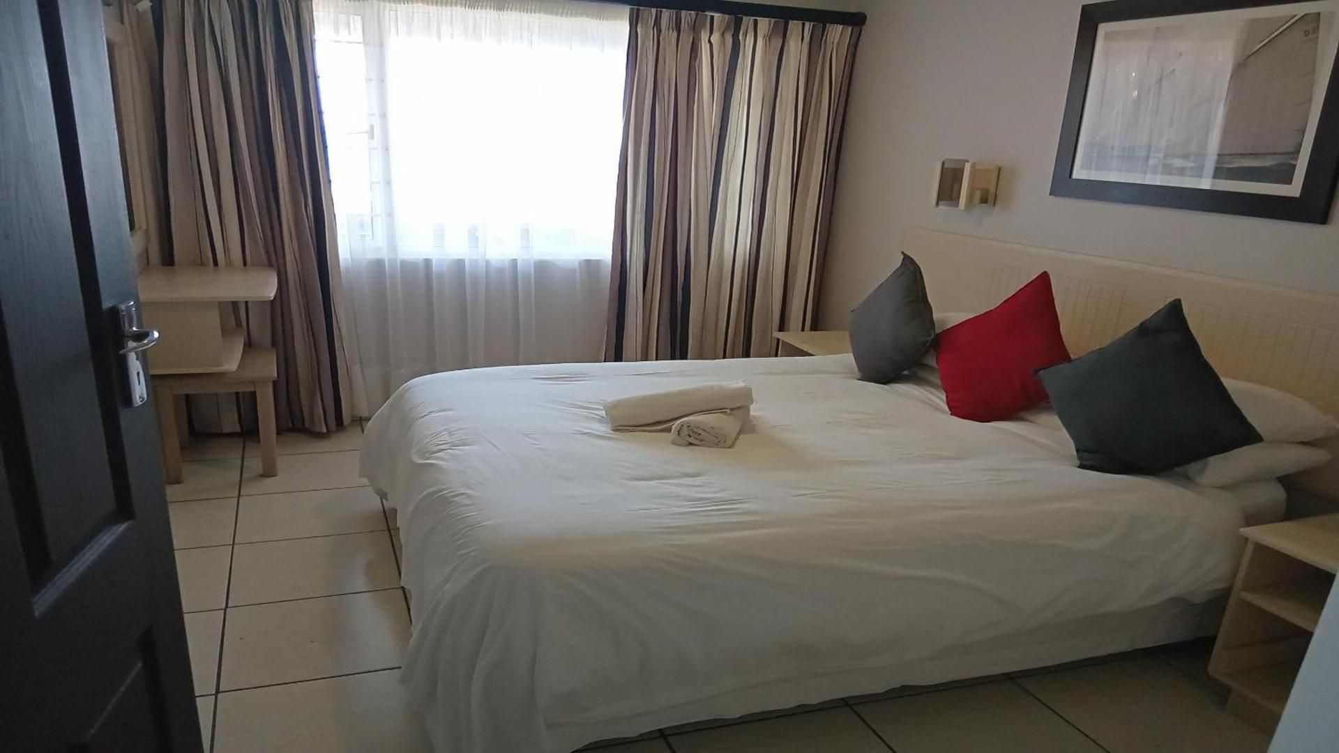One-Bedroom Apartment with Balcony and Sea View