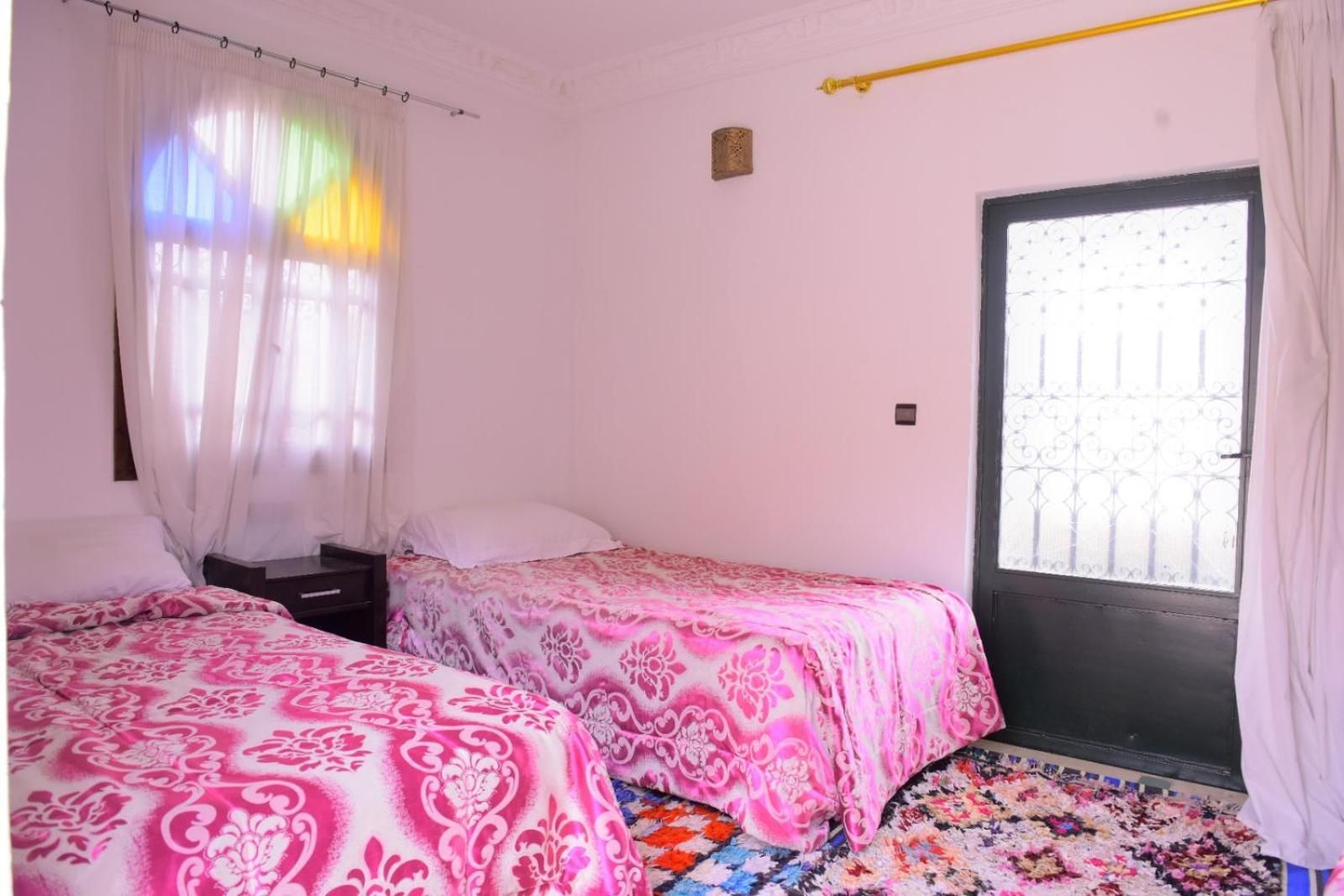 Economy Quadruple Room with Shared Bathroom