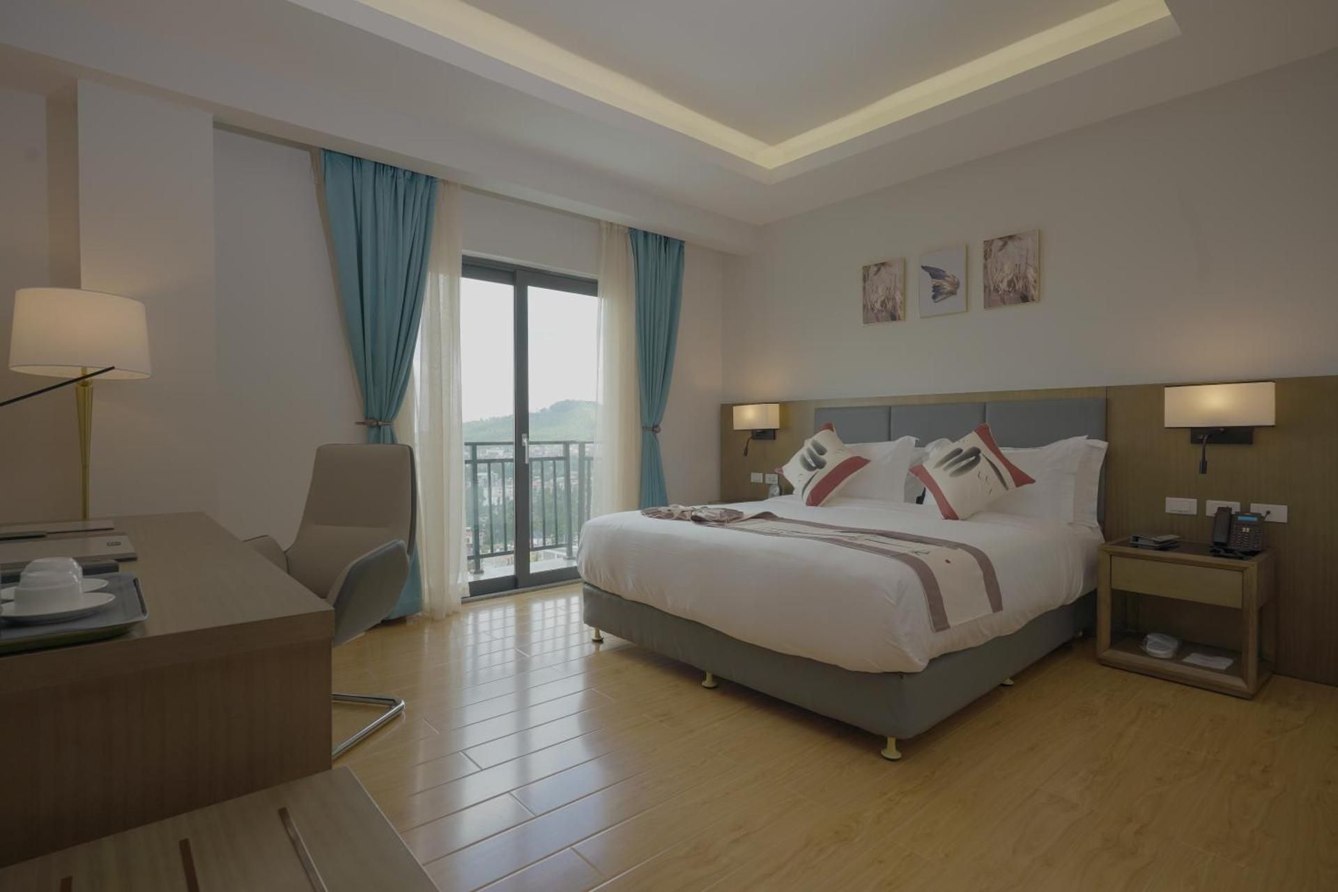 Deluxe King with Balcony