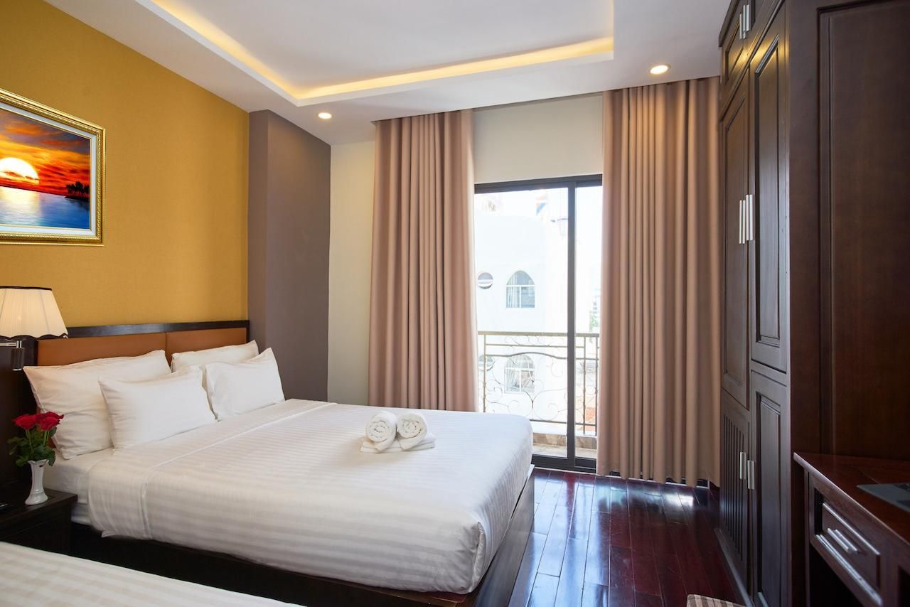 Deluxe Quadruple Room with Balcony