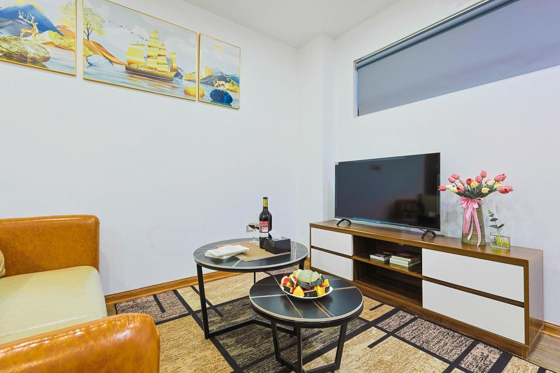 One-Bedroom Apartment with Balcony and City View