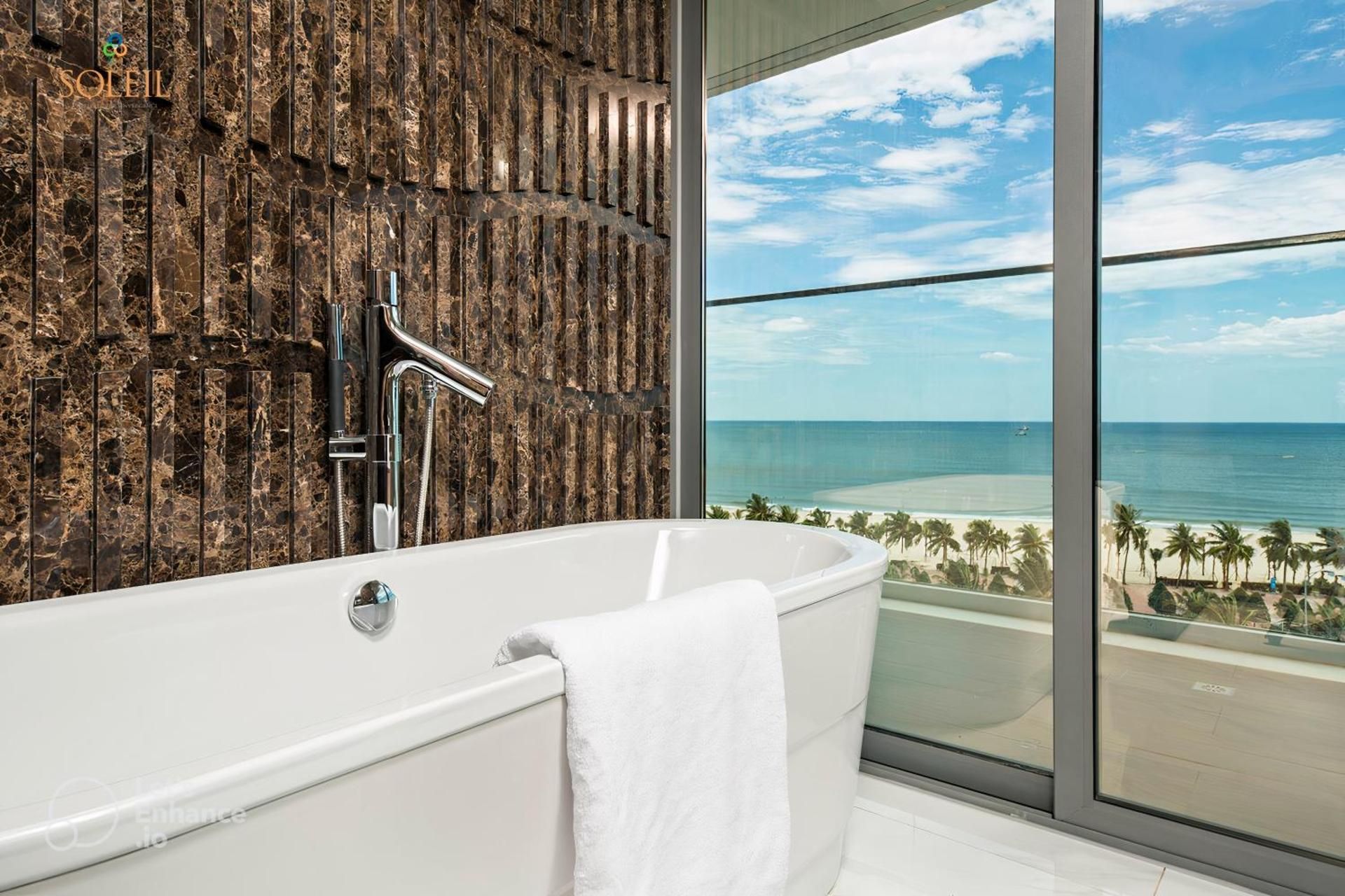 Two-Bedroom Deluxe Family Suite with Two King Beds and Ocean View