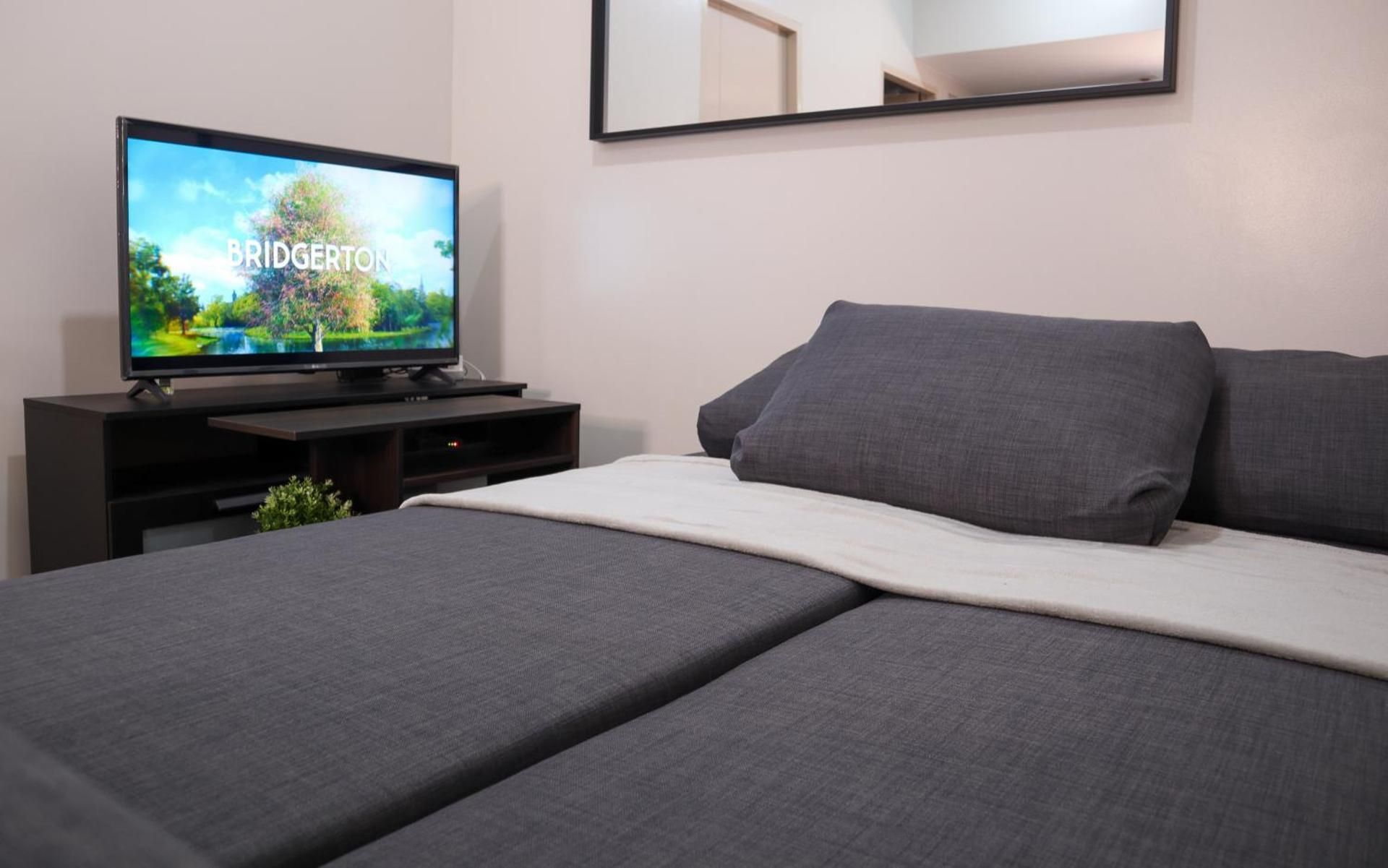 Cozy 2BR Condo w/ Parking | Walk to St. Lukes Two-Bedroom Apartment