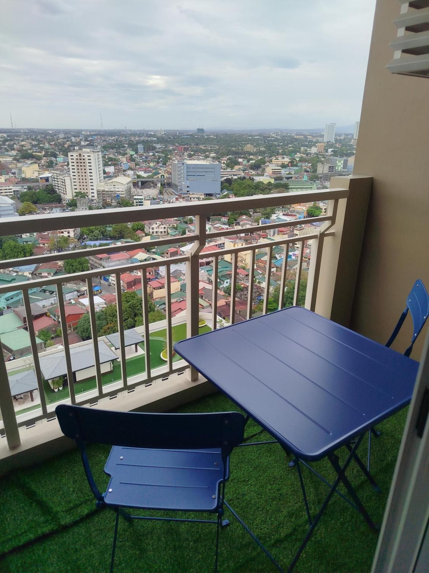 One-Bedroom Apartment with Balcony and City View