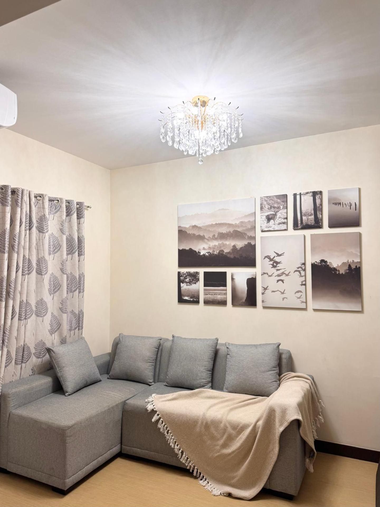 One-Bedroom Apartment with Balcony and City View