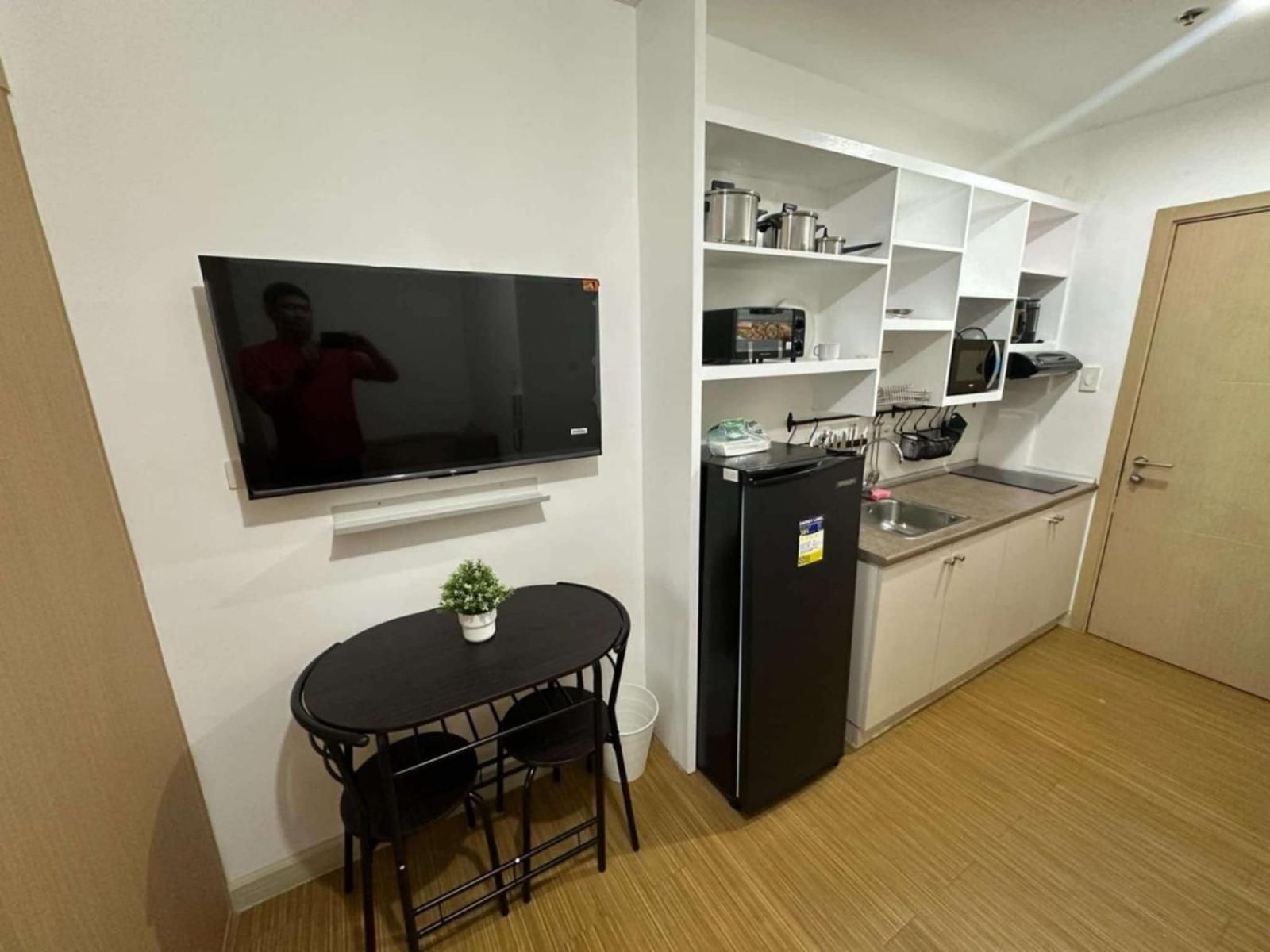 One-Bedroom Apartment with Balcony and City View
