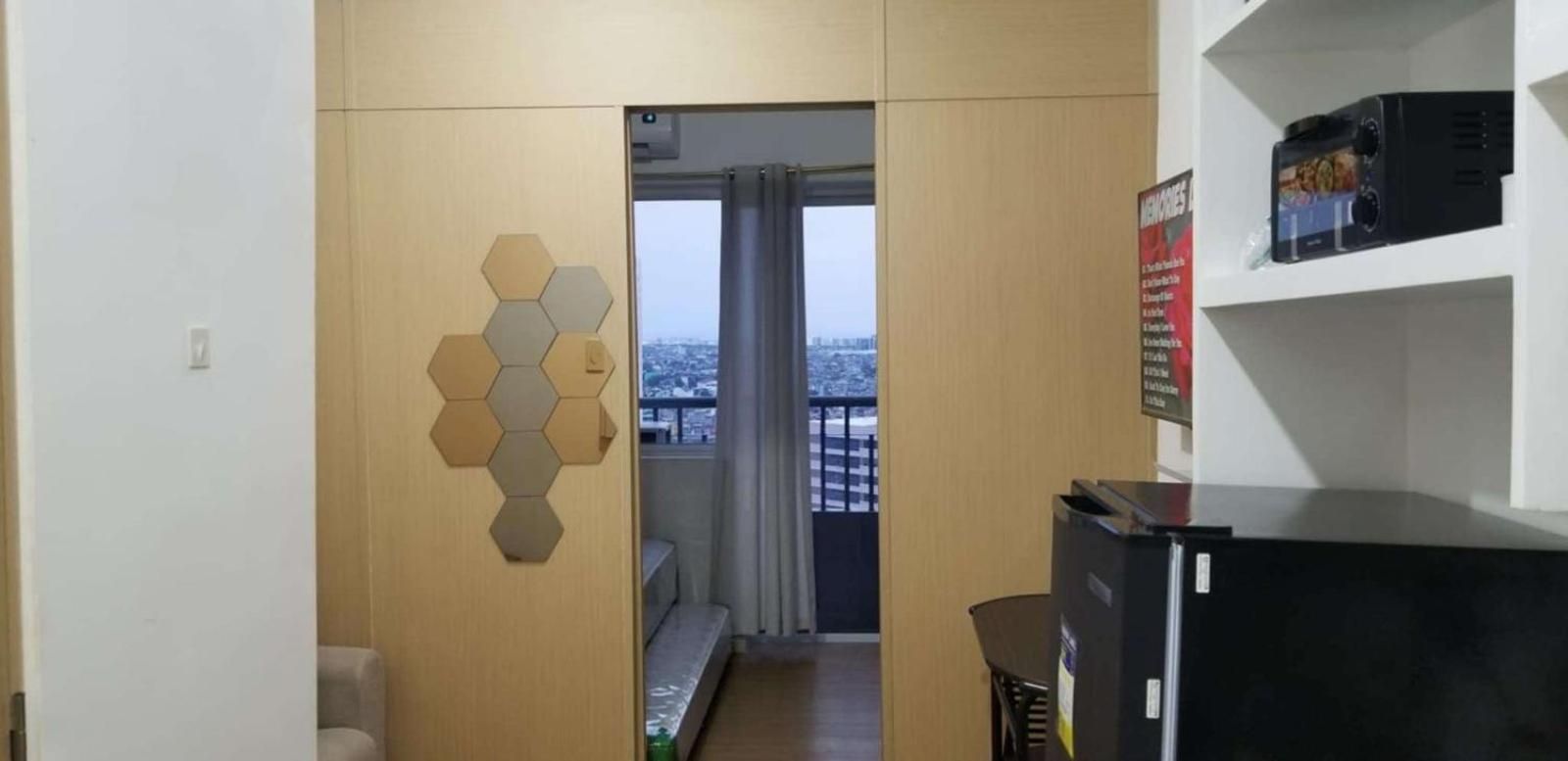 One-Bedroom Apartment with Balcony and City View